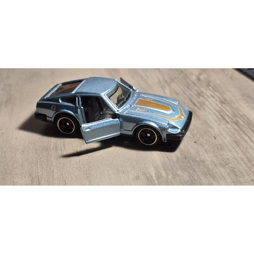 2020 Matchbox Moving Parts GTT20 '82 Datsun‎ 280 ZX Sky Blue Mtflk/Gold w/5sp NM